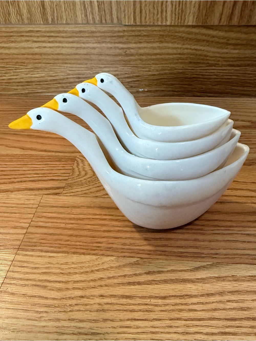 Four VTG Geese plastic measuring cups